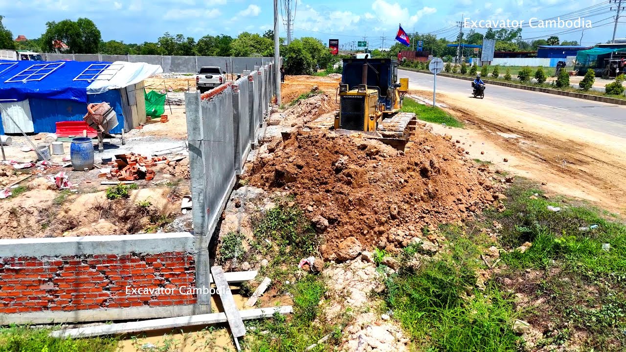 Hi Project Land Fill In Fence Use Komatsu Bulldozer And 25 Ton Dump Truck Dumping Land
