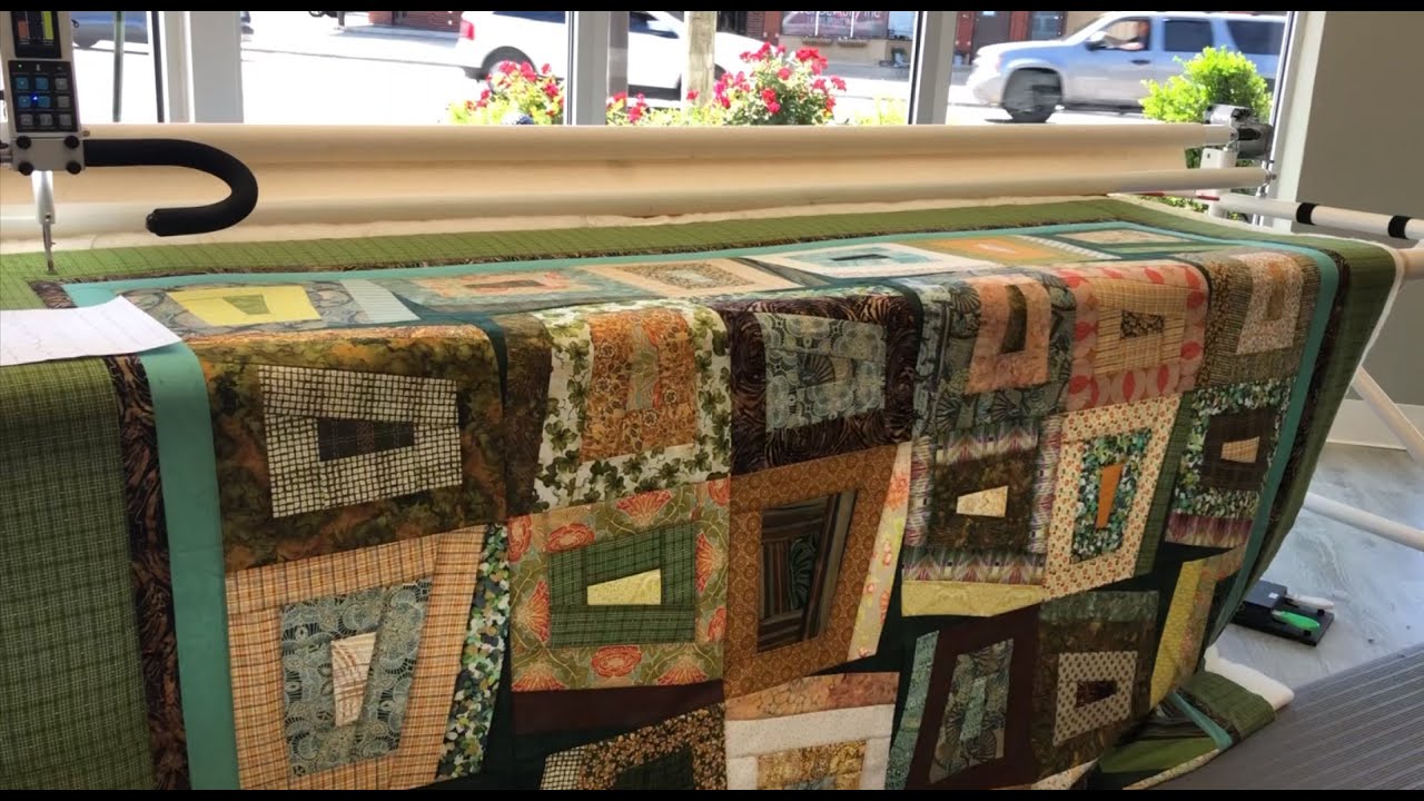 Long arm Techniques & Process Taught by Megan, a Professional Quilter, on a Peeking Points Quilt