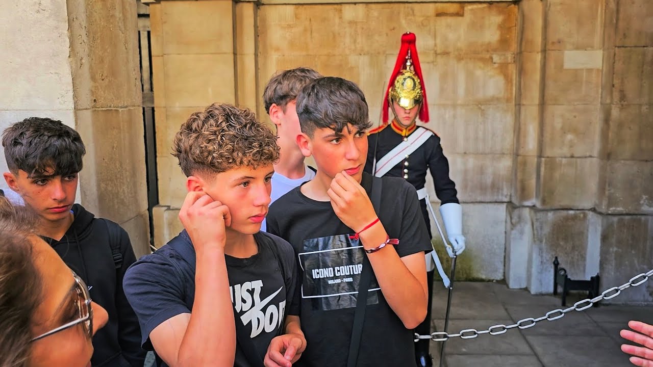 SPANISH KIDS DISRESPECT THE GUARD and one tourist even IGNORES THE POLICE at Horse Guards!