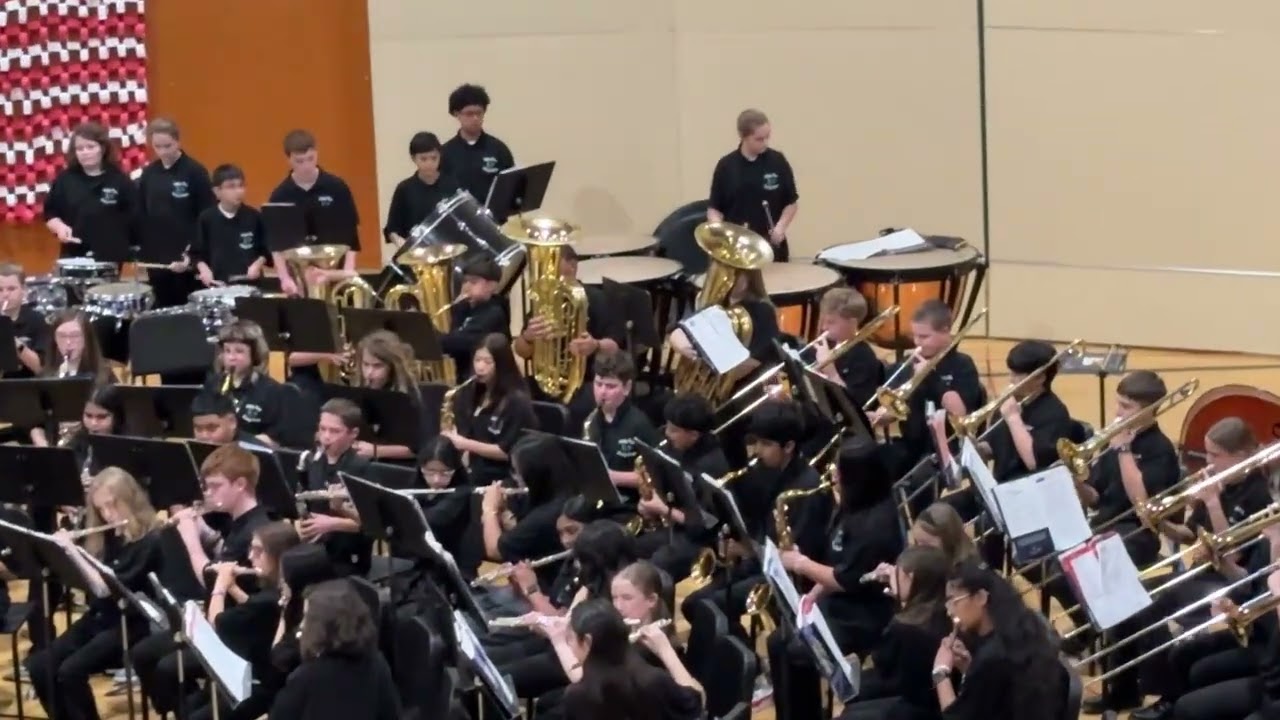 Sou at Middle school concert playing Flute 