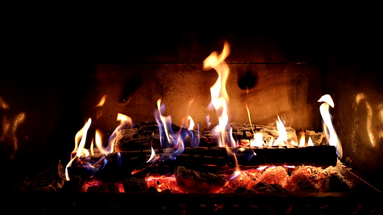 Crackling Fireplace with Golden Blue Flames and Orange Glowing Embers