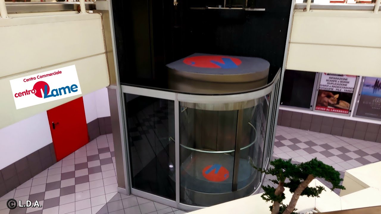 1995 SABIEM roped-hydraulic elevator at IPERCOOP C.C. CentroLame in Bologna IT