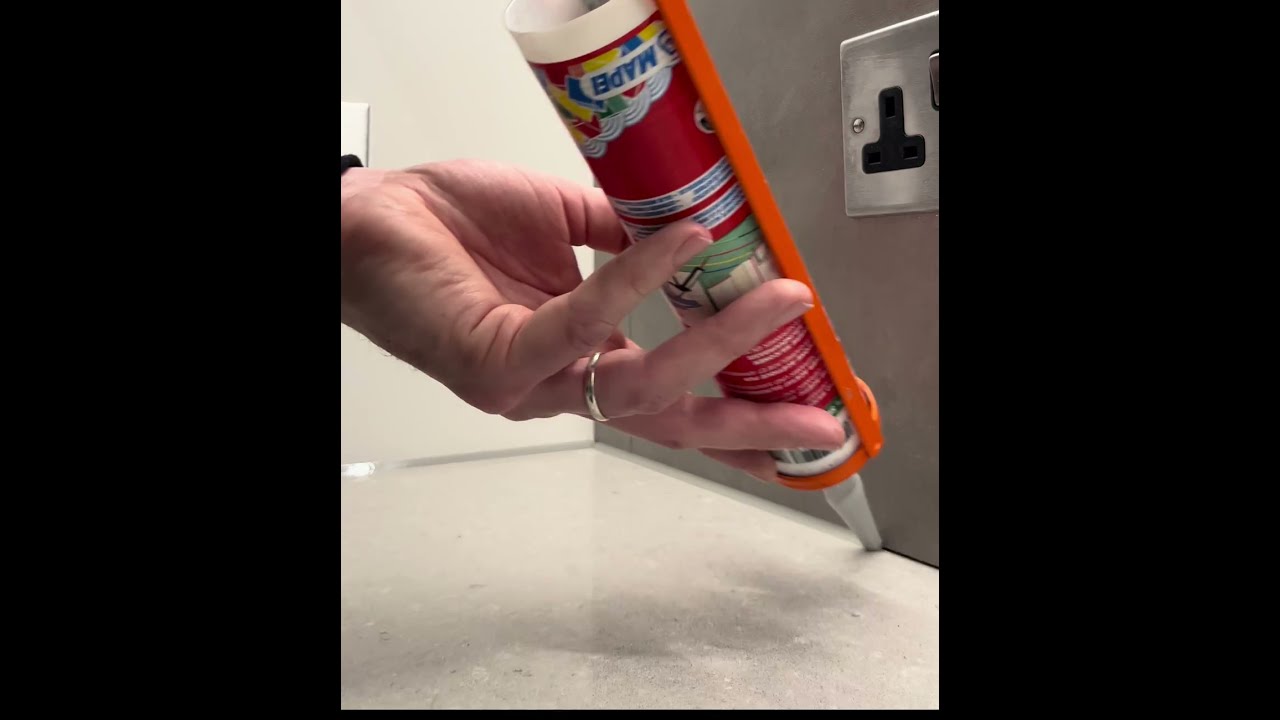Silicone sealant applied to Kitchen worktop