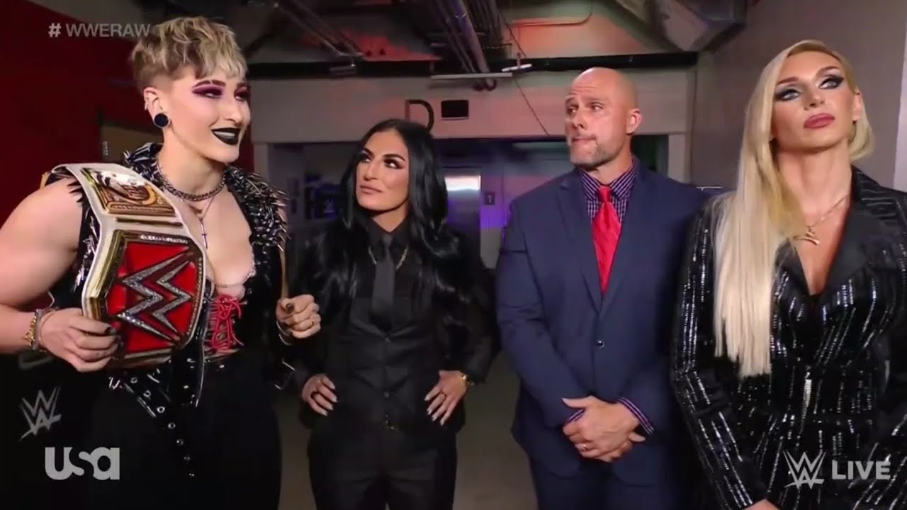 Adam Pearce, Sonya Deville, Charlotte Flair & Rhea Ripley Backstage