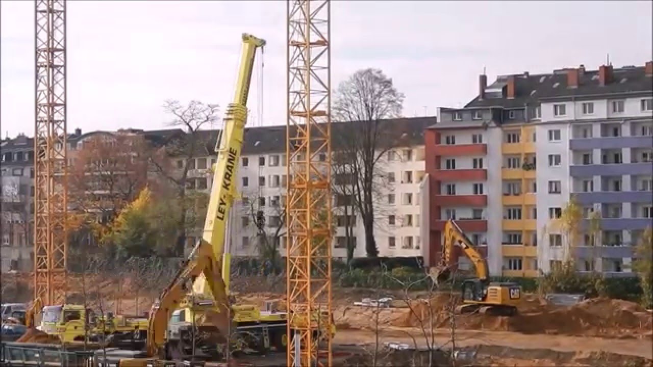 Liebherr Crane LTM 1300 and tower crane construction site