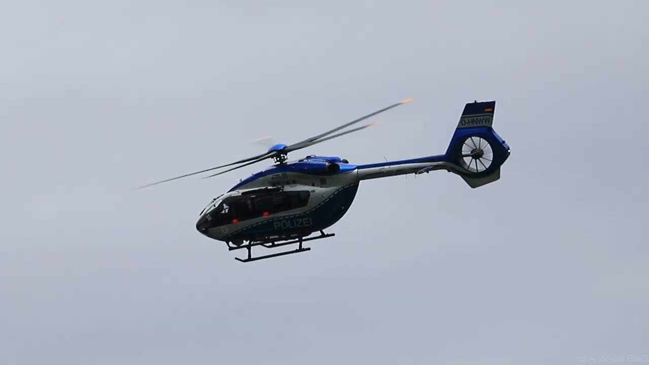 Police helicopter D-HNWW in flight during a SWAT training