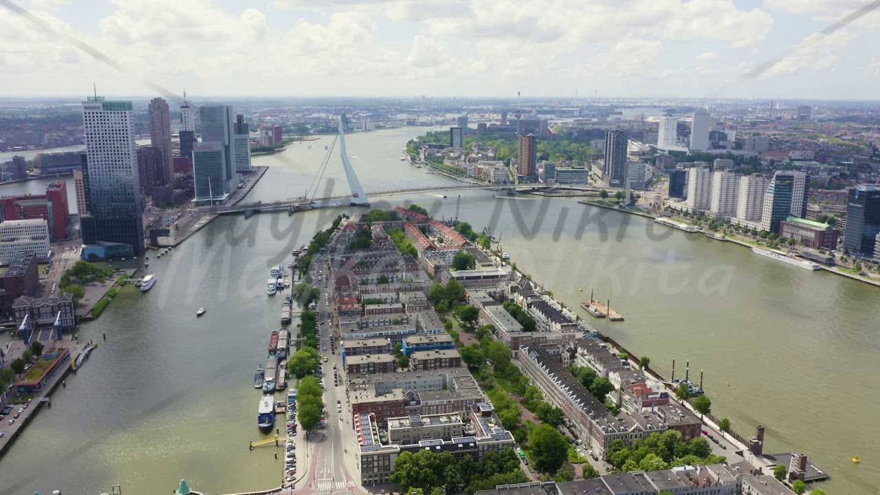 Rotterdam, Netherlands. Norderayland Island ( North Island ) and Erasmus Bridge ( Erasmusbrug ) ove