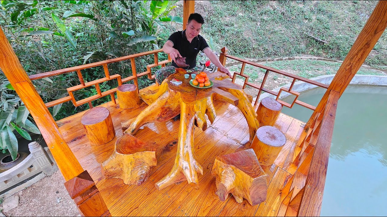 Complete the set of tables and chairs made from large tree trunks.