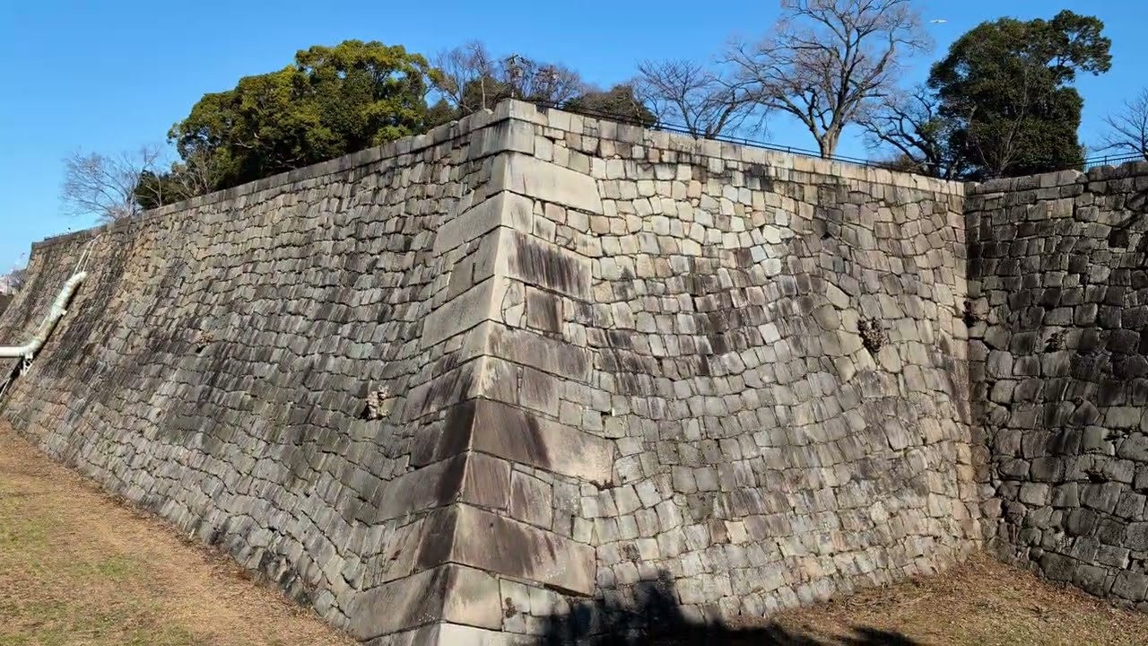 Walking past moats in Osaka Castle Park, Osaka, Japan, 2025-12-20