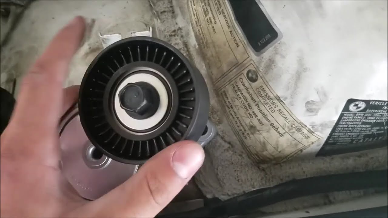 Замена натяжителя ремня безопасности BMW E36