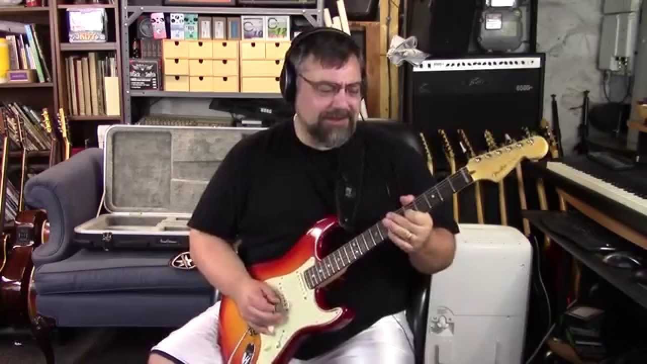 Fender American Deluxe HSS Stratocaster in Aged Cherry Burst