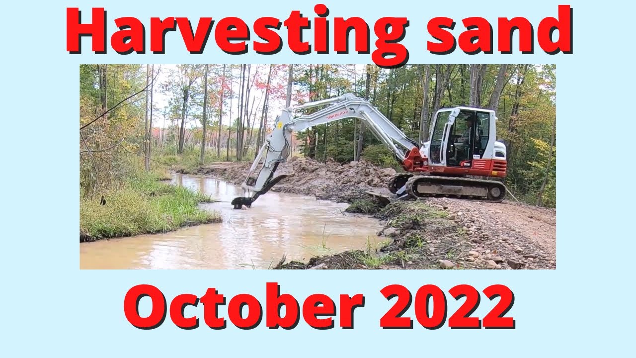 Harvesting sand from a canal