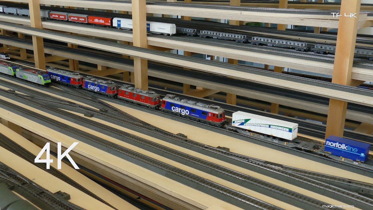 Viele Züge auf der H0-Anlage bei Zugkraft Stucki - Modelleisenbahn 4k