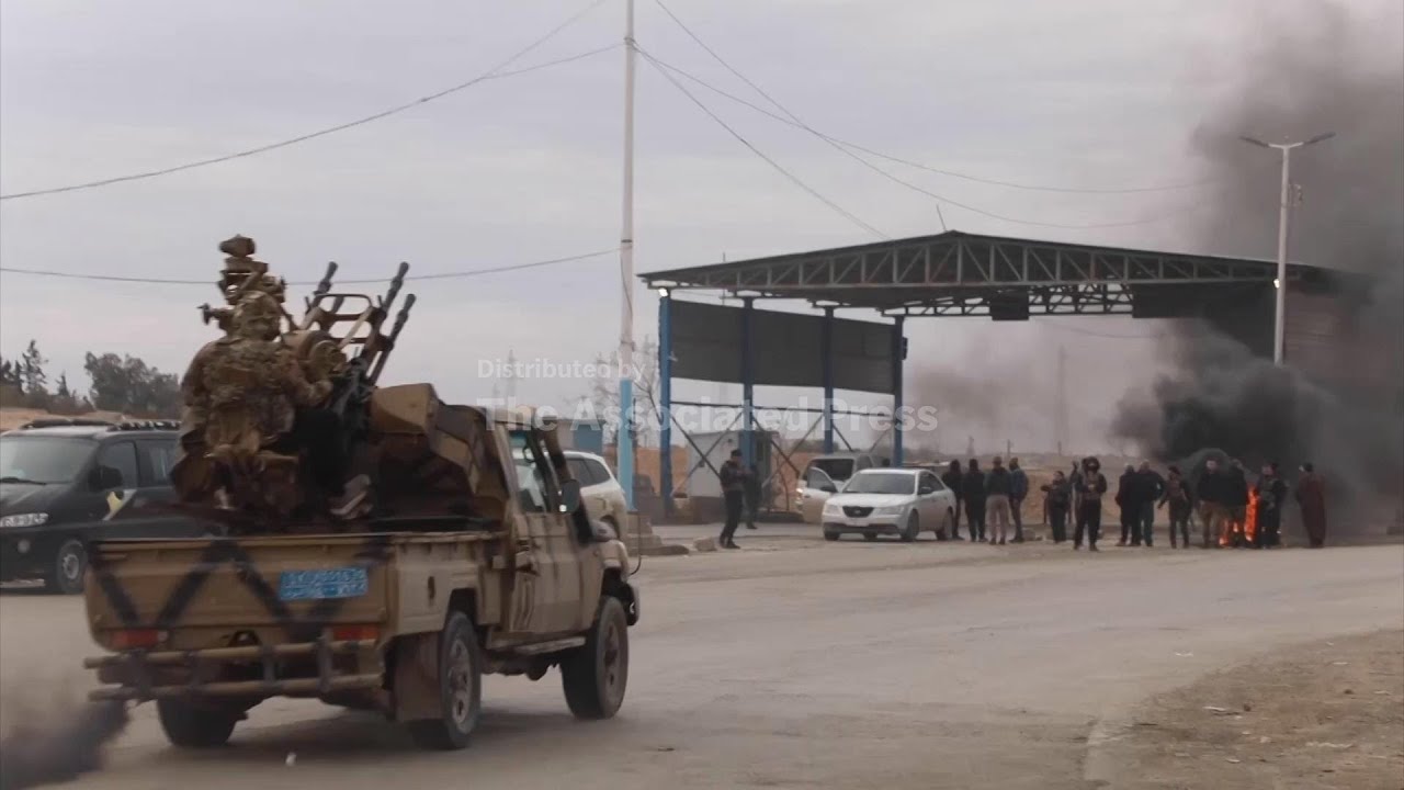 Syrian government forces enter northern towns after Kurdish fighters withdraw
