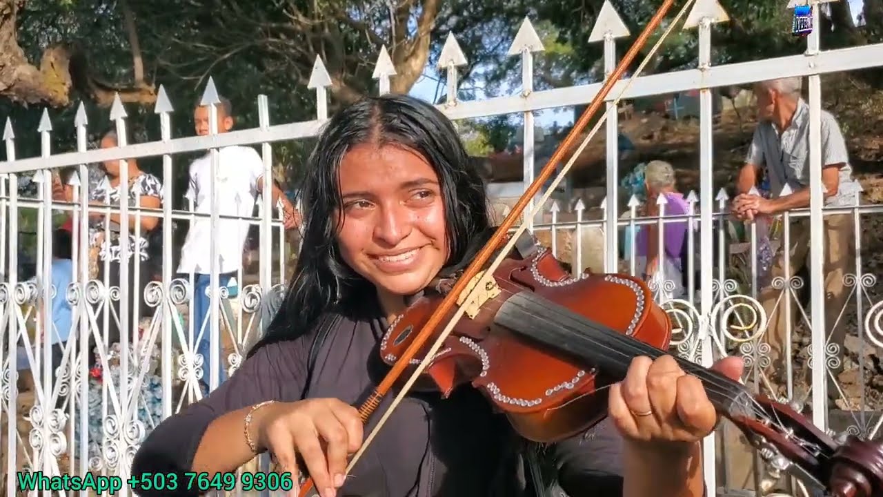un entierro con música y alabanzas