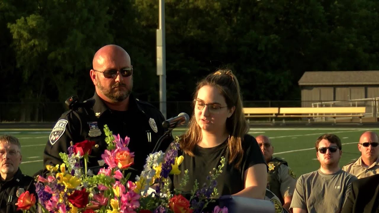Fianc&eacute;e of shooting victim speaks at vigil in Muscatine