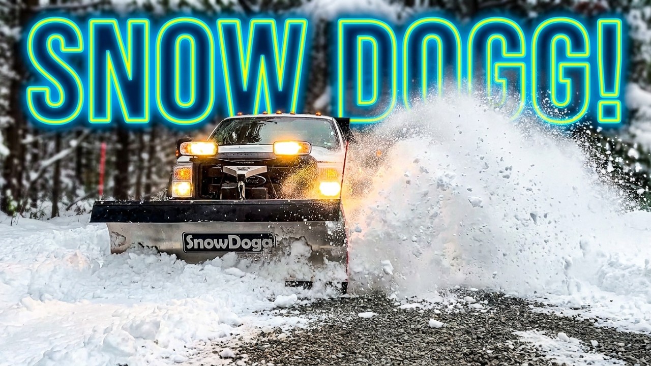 . Plowing snow in the gravel driveway with the snowdogg