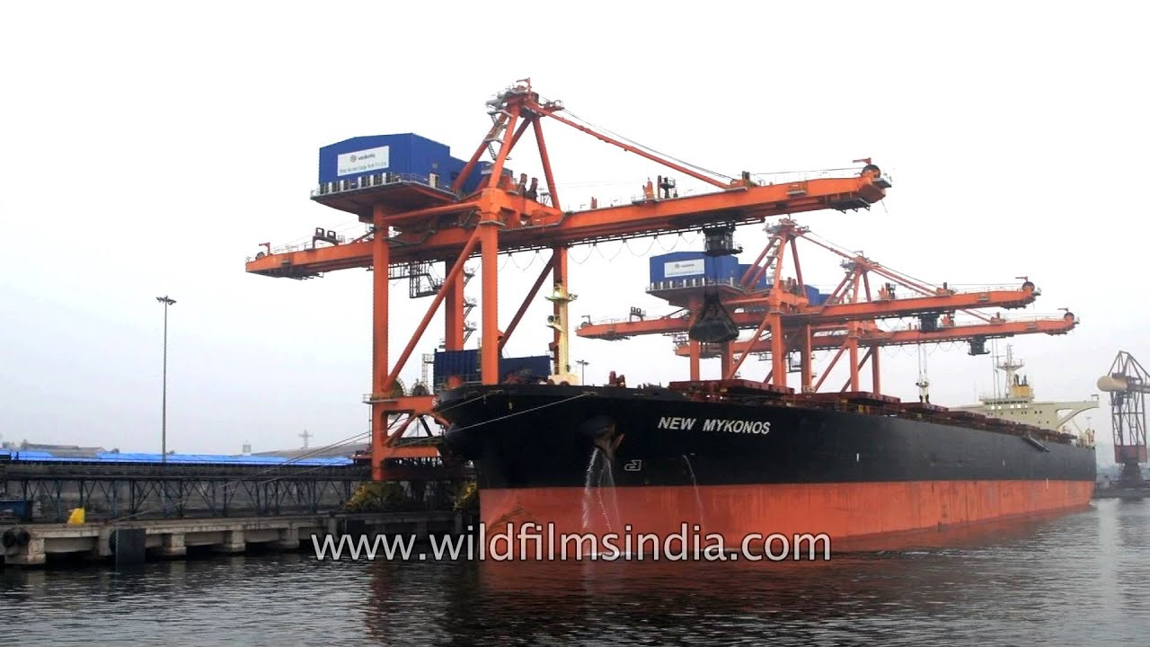 Coal containers being loaded onto New Mykonos ship at Visakhapatnam Port, india