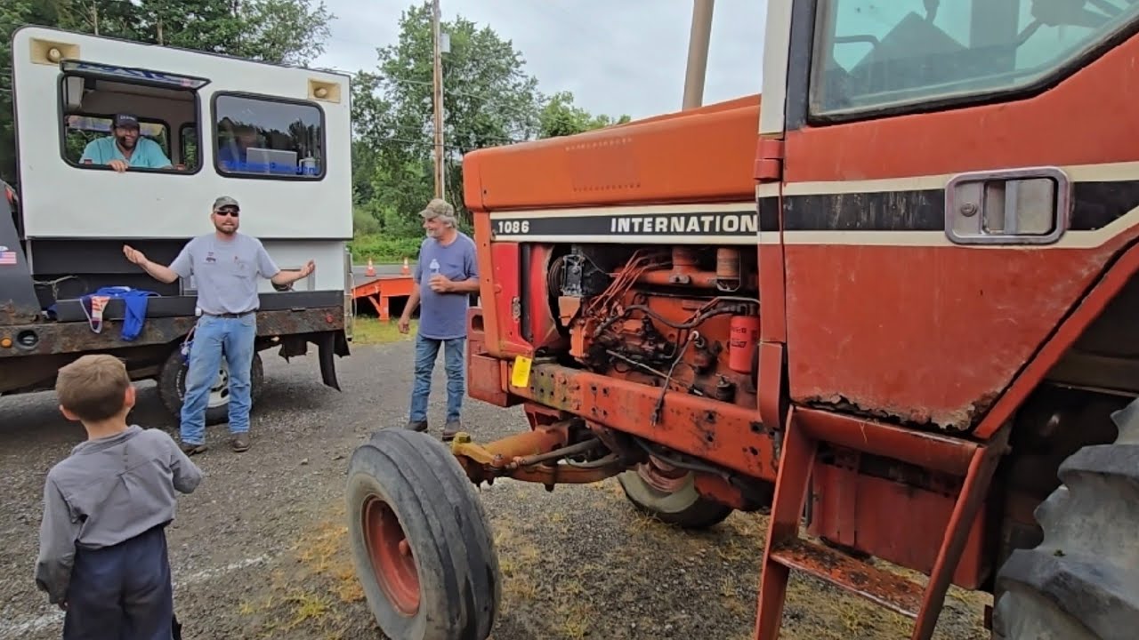 Multi-Color Tractors Sell at Auction