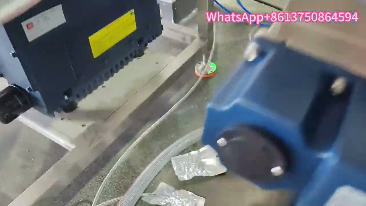 Aluminum foil bags ​​Vacuum packaging  machine with bowl elevator liquid filler packaging machine