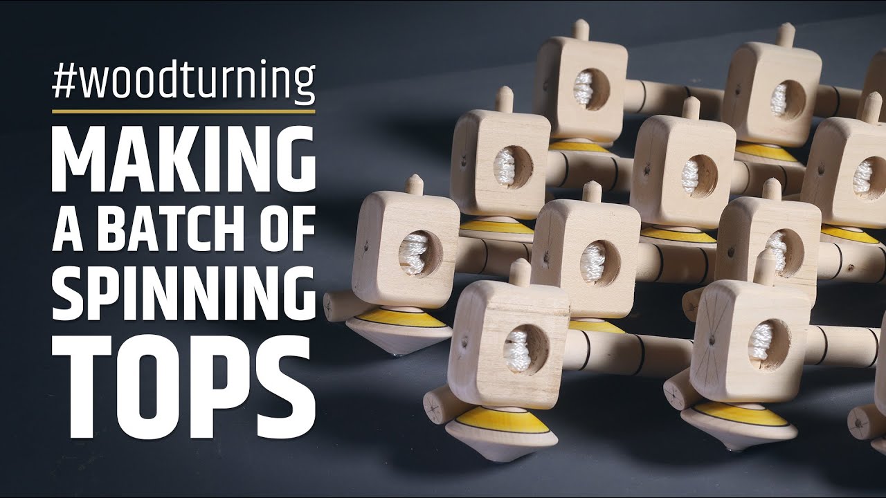 Woodturning a batch of spinning tops
