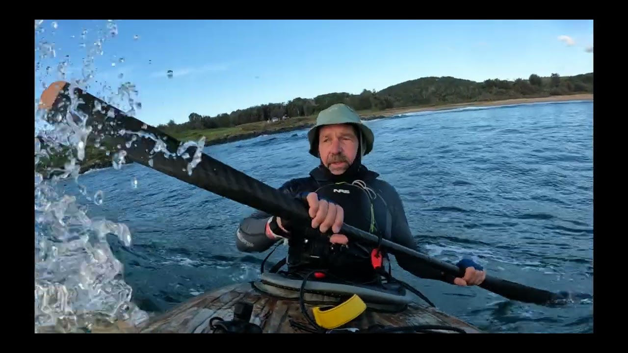 surfing wooden and plastic kayaks