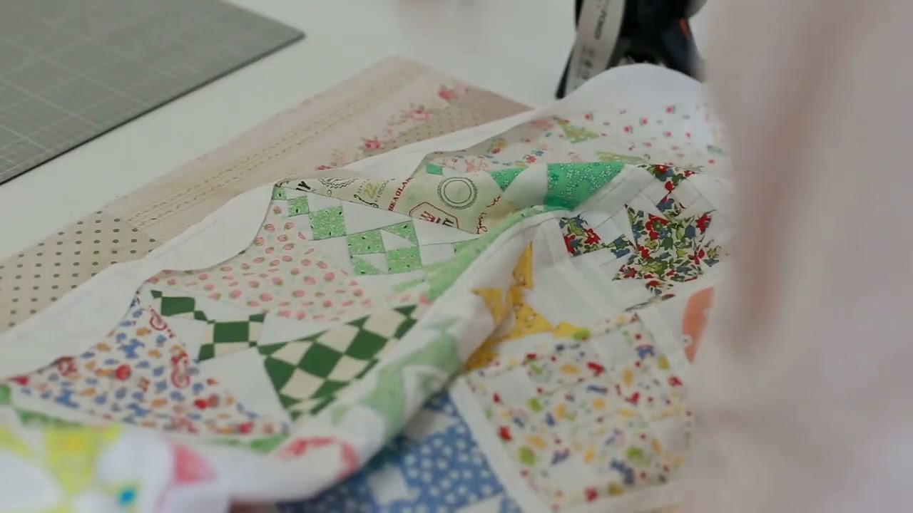 How do I finish my Dear Jane Quilt with the curved border