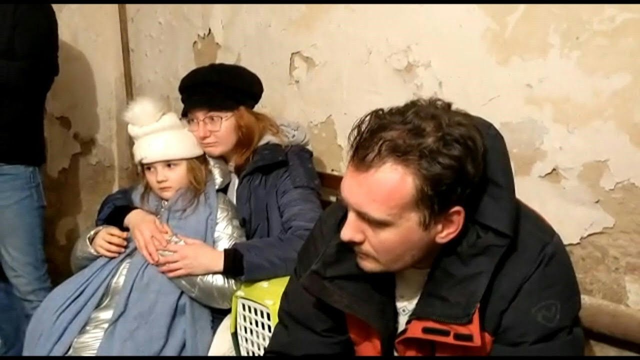 Ukrainians shelter in a basement as fighting begins in Kyiv streets | AFP