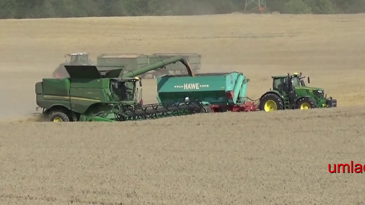 Fruchternte auf R&uuml;gen mit John Deere M&auml;hdrescher