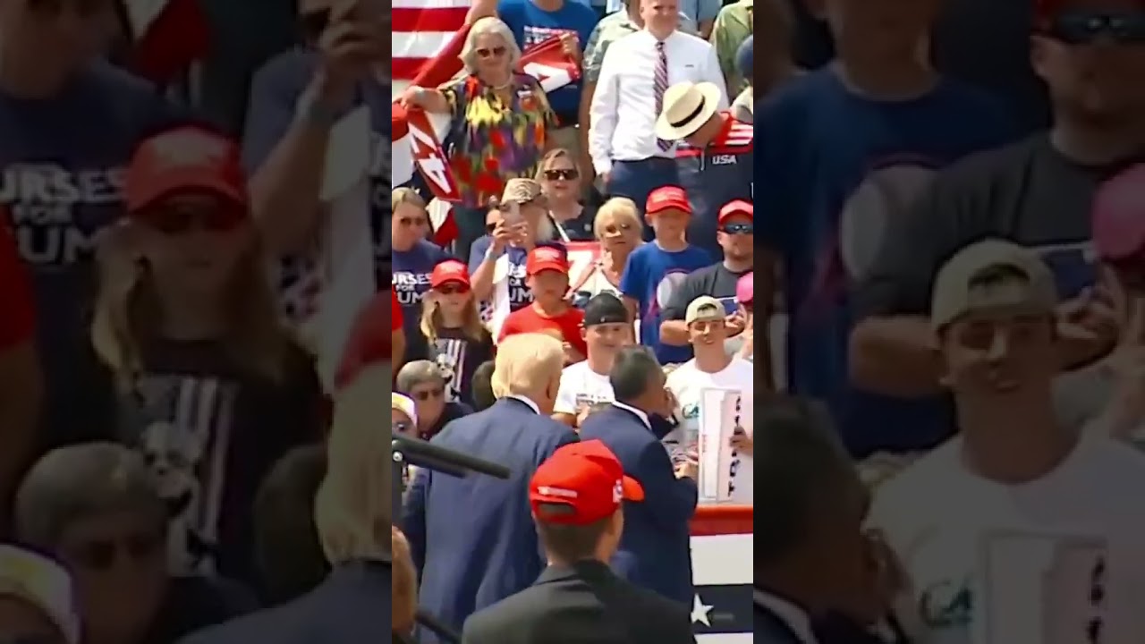 Moment Trump leaves bulletproof barrier to hug fan who needs medical attention