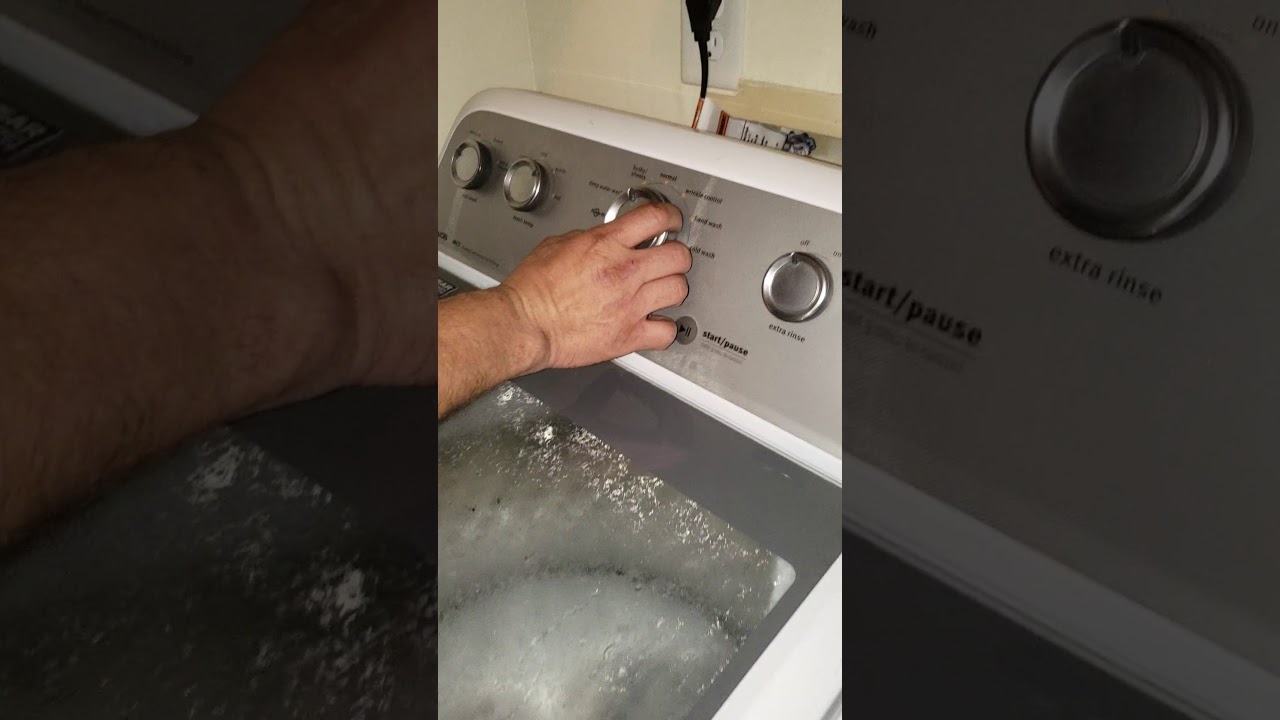 Repair man shows how to recalibrate Maytag Bravo