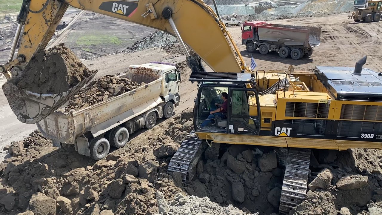 Caterpillar 390D Excavator Loading Mercedes Arocs 4142 And Man Trucks - Pyramis ATE