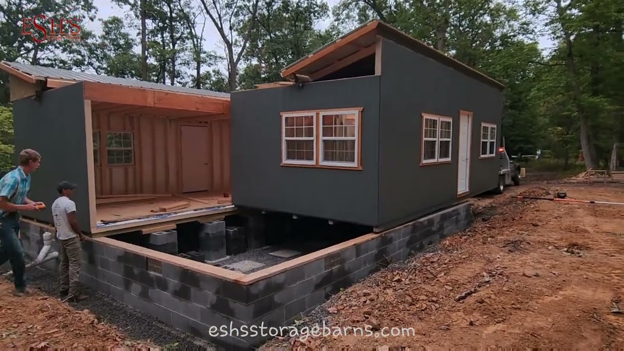 Setting a Double Wide 2 story cabin on a foundation. Esh's Storage Barns
