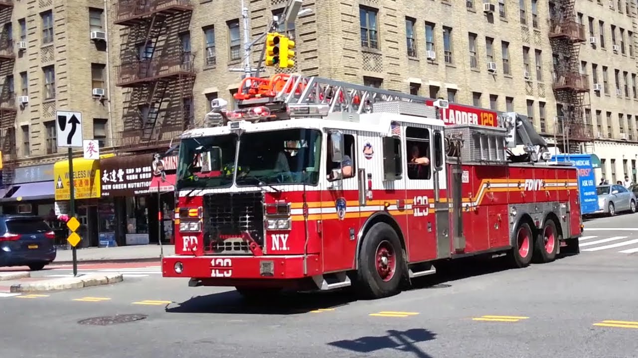 FDNY ladder 129 responding with lots of siren & air horn while stuck in traffic