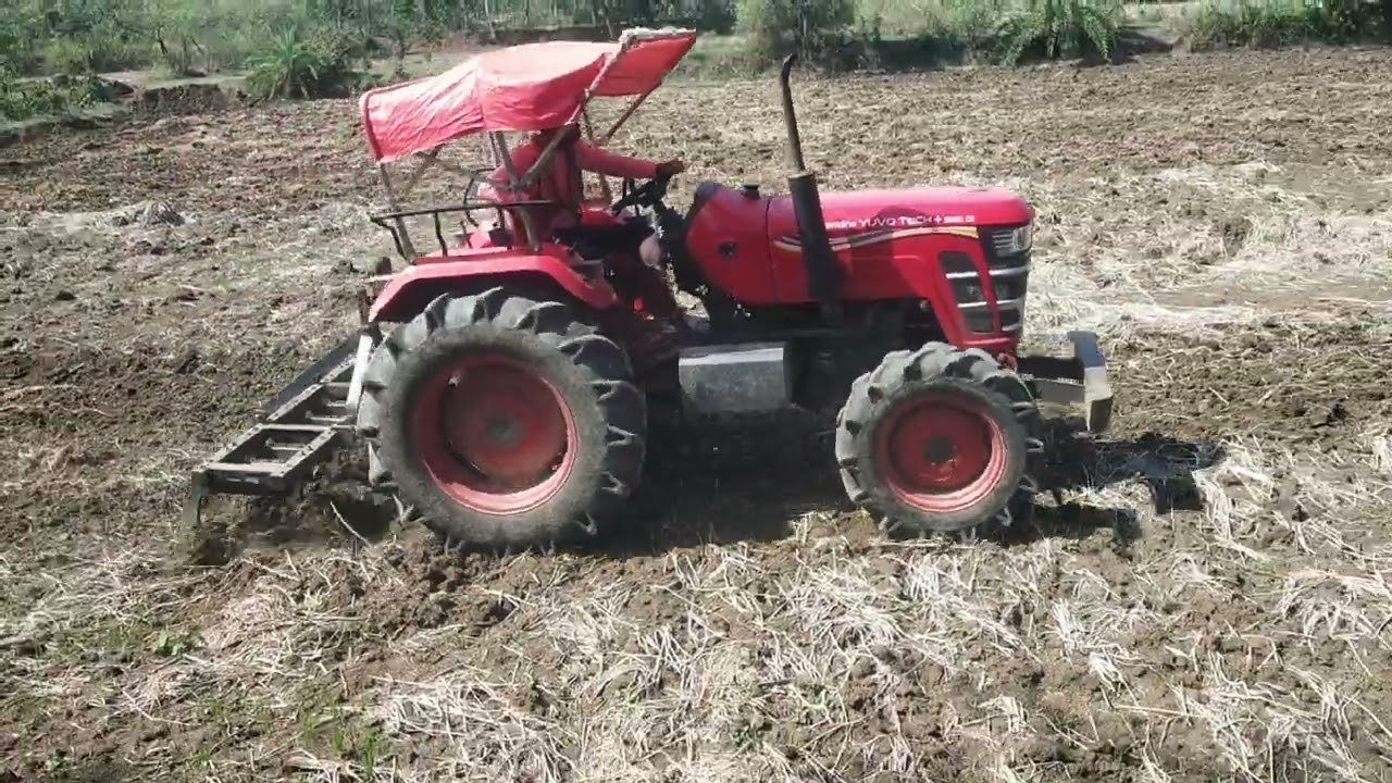 Tractor plaughing for paddy tracker game running cultivation 