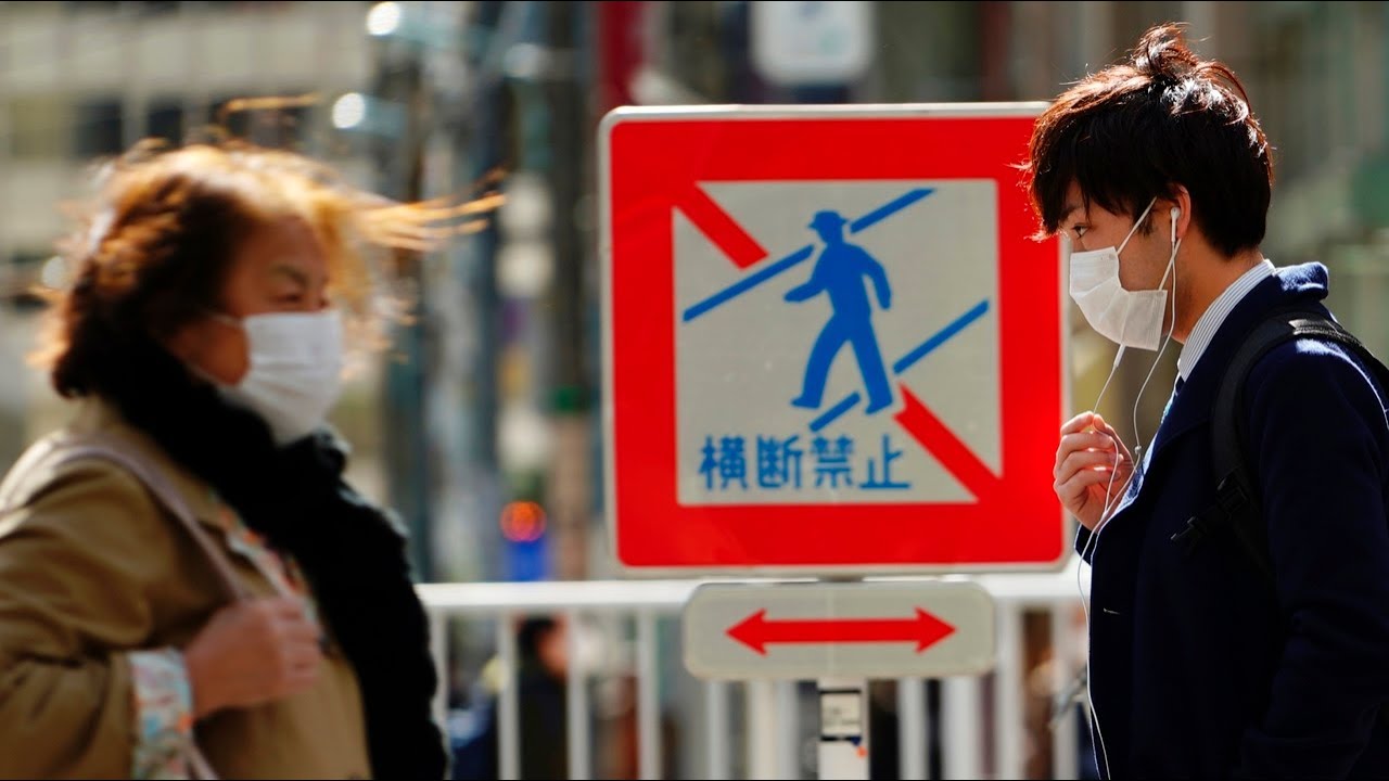 Japan reports record COVID-19 daily spike with nearly 1,000 new cases