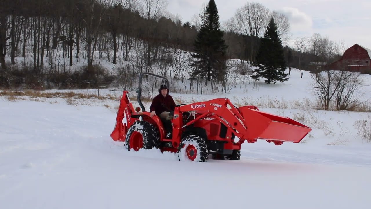 Brand New Kubota L2501/ BH77/ LA525 with R14 Tires Driving Through Deep Snow