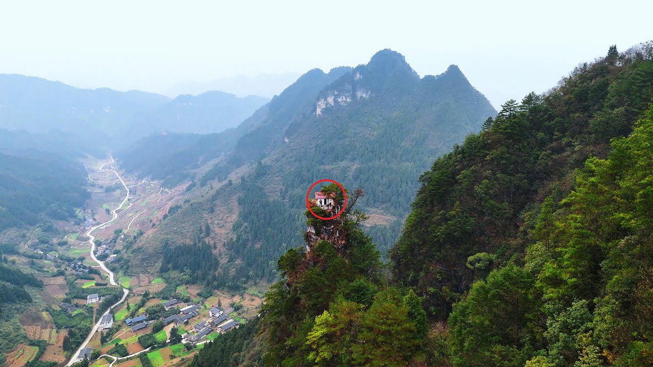 貴州深山萬丈懸崖之巔發現不到2平方公尺懸崖小屋，爬上去隨時有掉下懸崖的風險，古人是怎麼修建的。