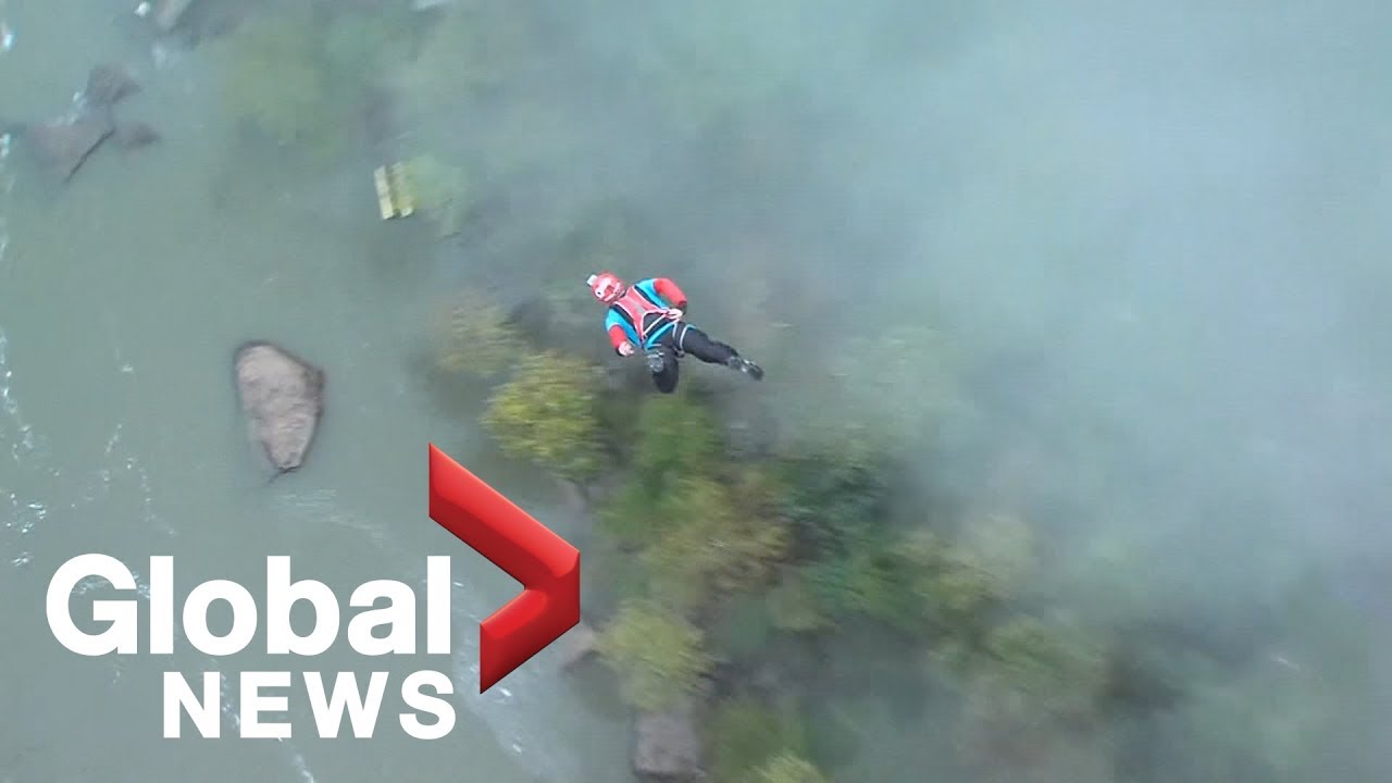 Daredevils BASE jump into New River Gorge at West Virginia Bridge Festival