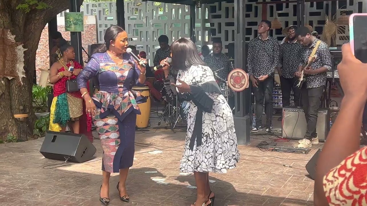 Piesie Esther joins Nana Ama McBrown in worship at the welcome ceremony to the Onua Group.