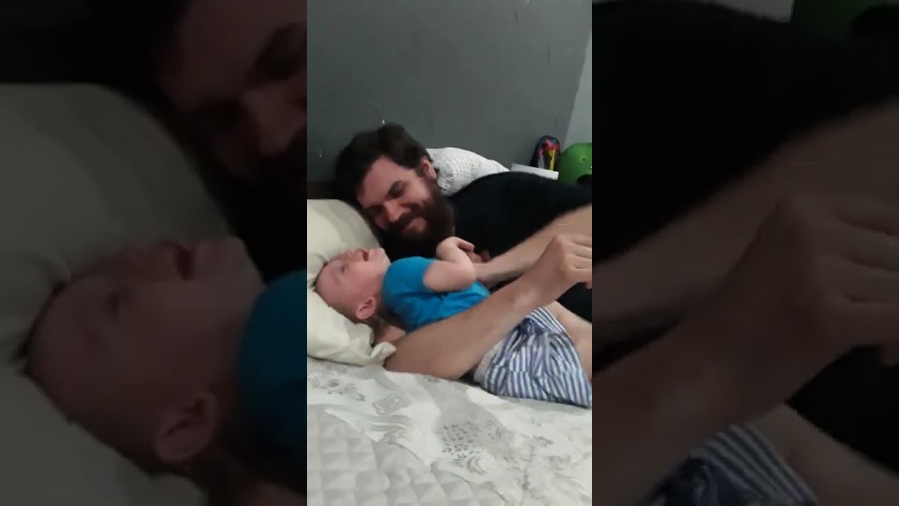 Baby getting tickled to death. Giggle and laughs