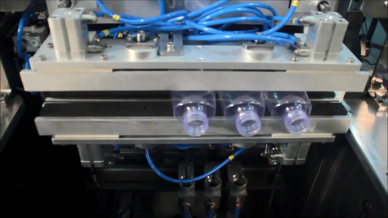 Cleaning of Bottles/Containers through Rotary Airjet Cleaner Machine