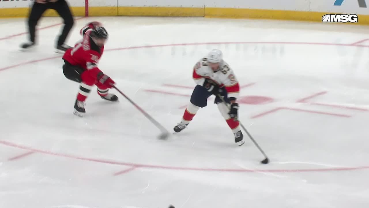 Evan Rodrigues scores a goal against the New Jersey Devils