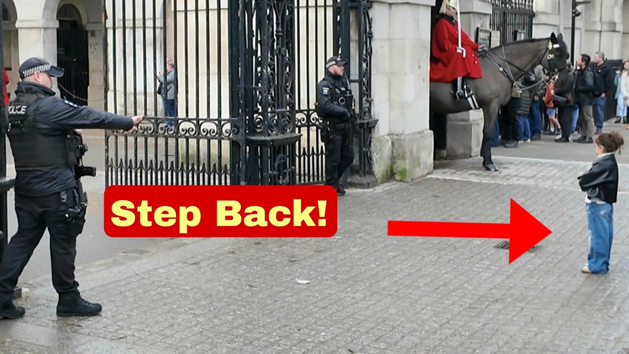 Where's the parents? POLICE told the kid to go behind the bollards!