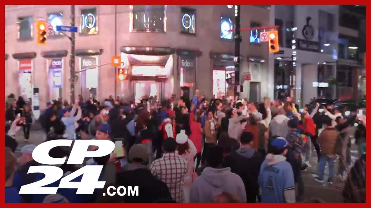 Watch Blue Jays fans celebrating in the streets of downtown Toronto