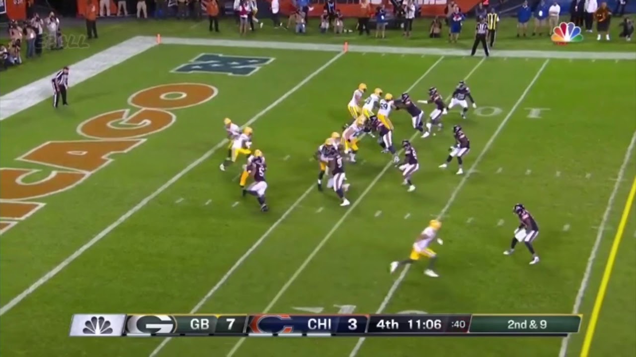 Trevor Davis drops to a knee to reel in Rodgers&rsquo; throw for 28 yards