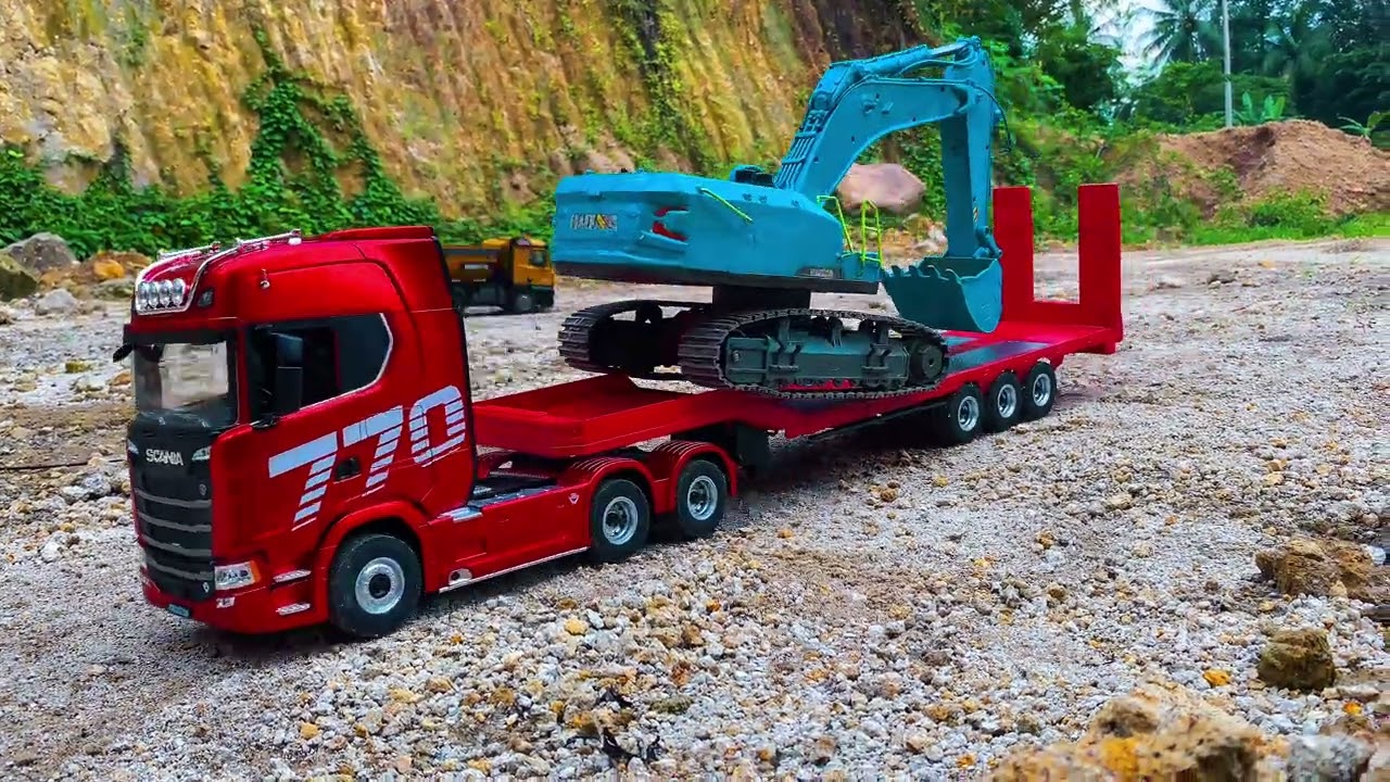 Review of the Rc Excavator huina 1593 sand loading action in mining construction