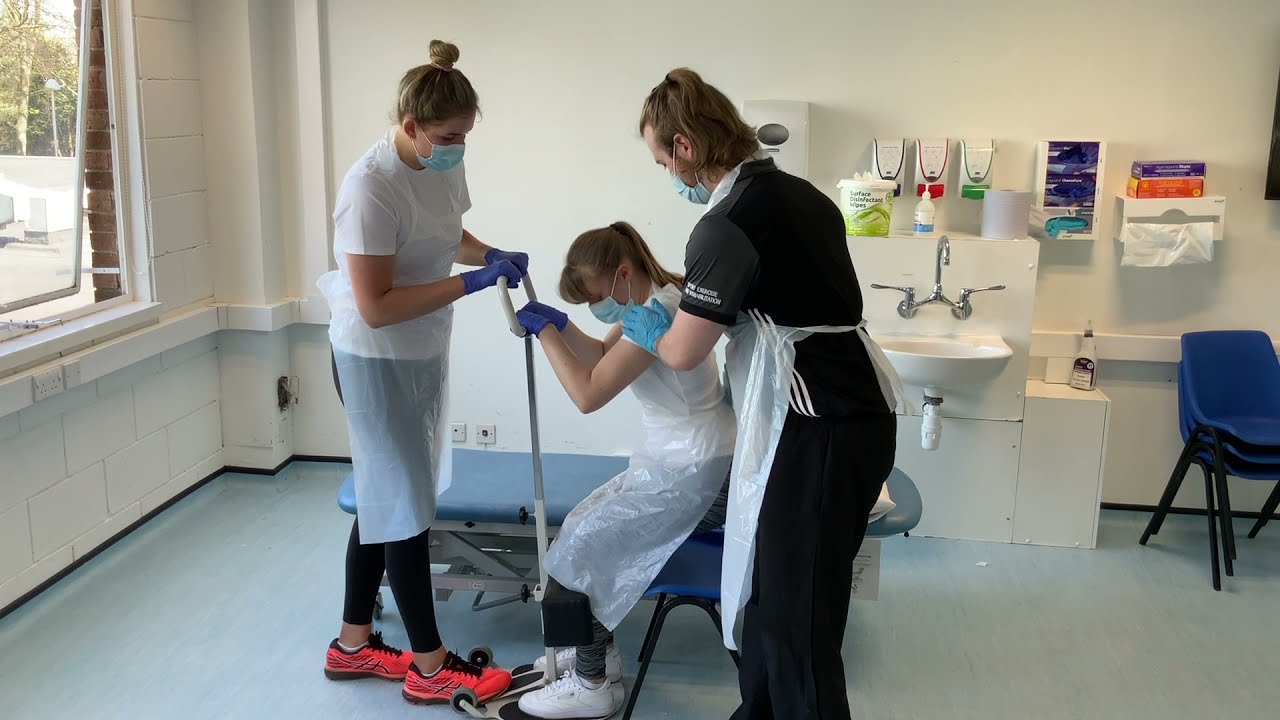 Moving a patient using a rotary turner from a bed to a chair - MSc Physiotherapy portfolio