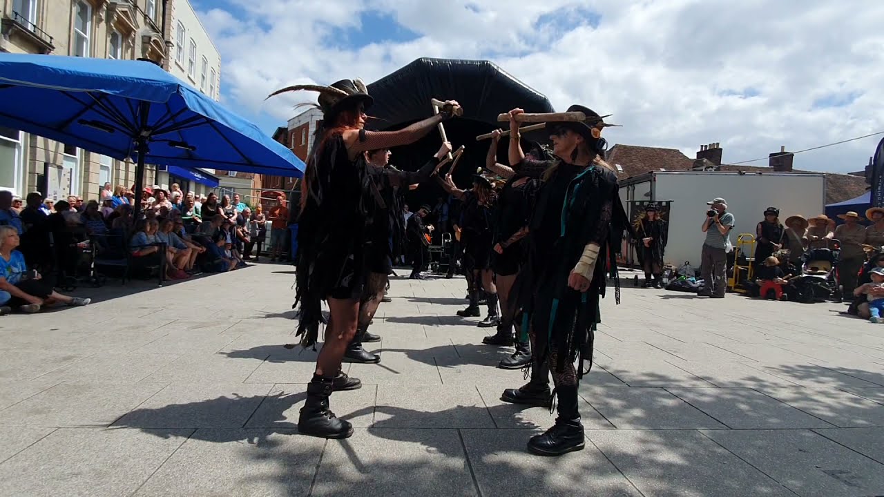 Beltane Border Morris dancing Tolmen Stone at Wimborne Folk Festival 12 Jun 2022
