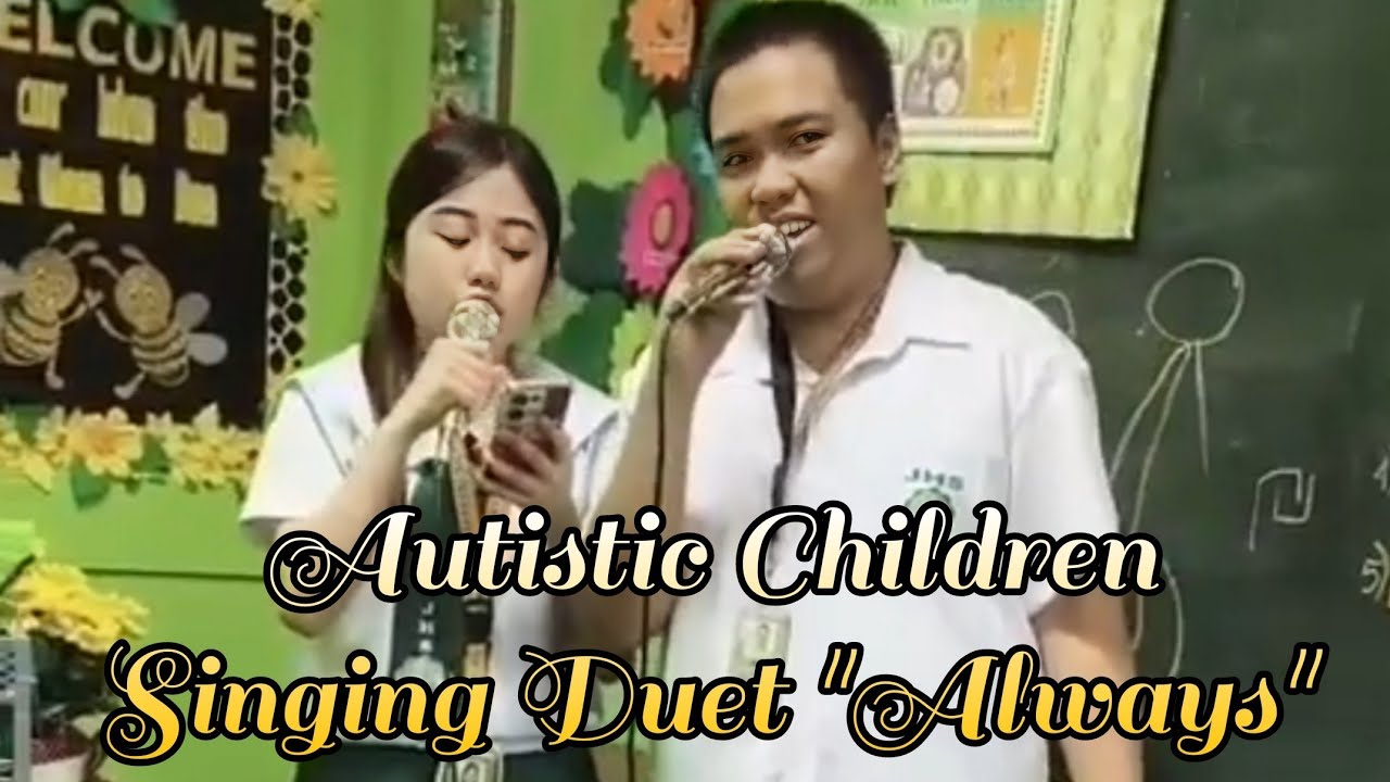 Autistic Children Practice Singing A Duet Song at School 